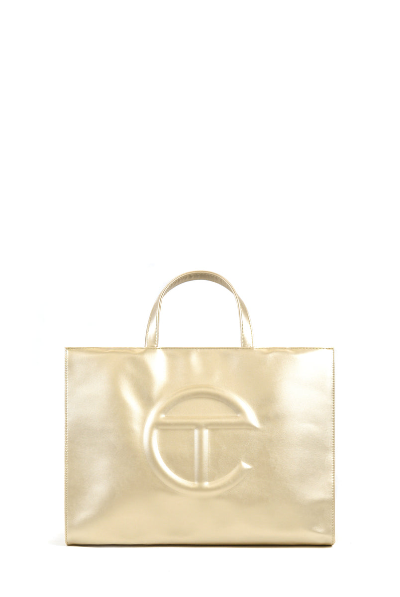 large gold telfar bag